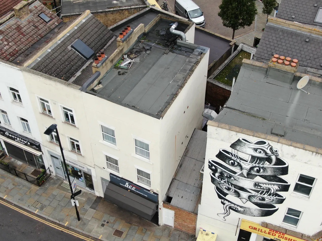 Drone survey London aerial view commercial buildings Herne Hill SE24 showing roof conditions